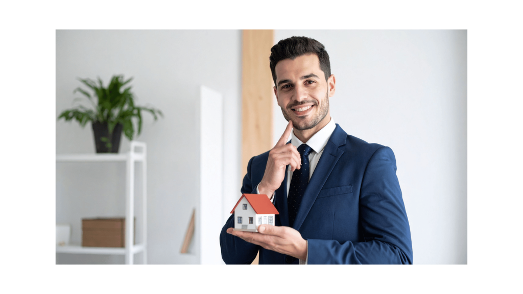 Real estate professional in a suit holding a miniature house to illustrate how home sellers can use flat fee MLS listings.