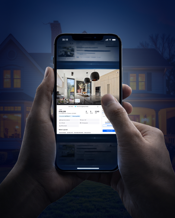 Smartphone displaying the Zillow website.