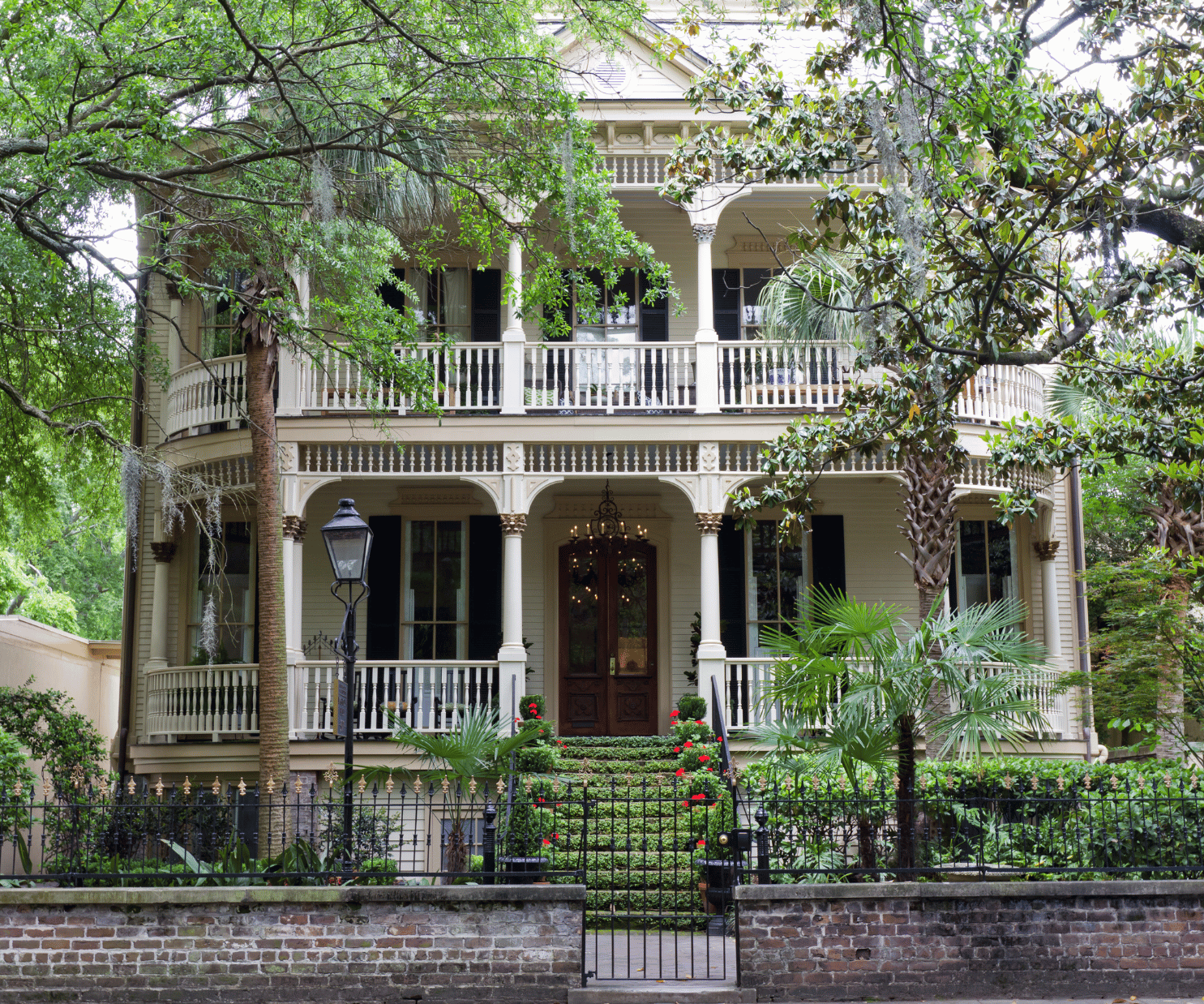 Georgia home with wrap around porch and trees