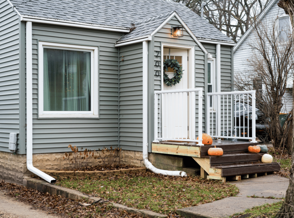 Minnesota grey house with pumpkin