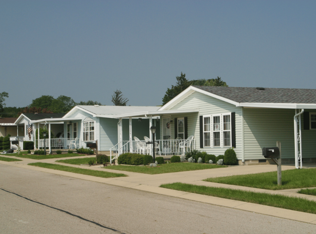 ohio white modular home with green front lawn