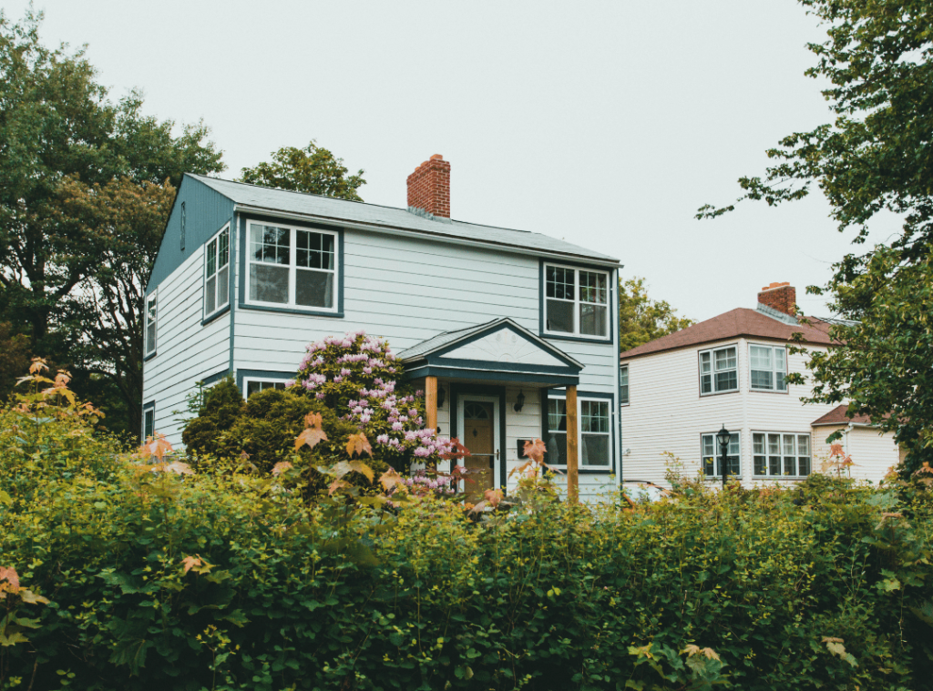 missouri home with garden in front