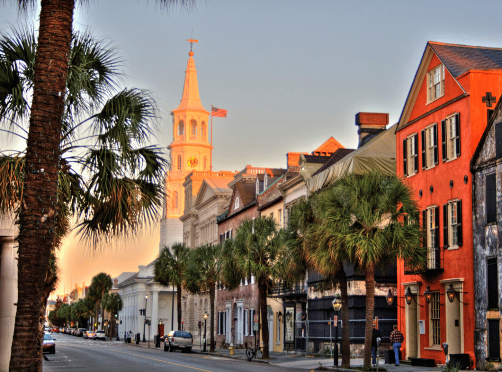 coastal south carolina street with homes and palm trees