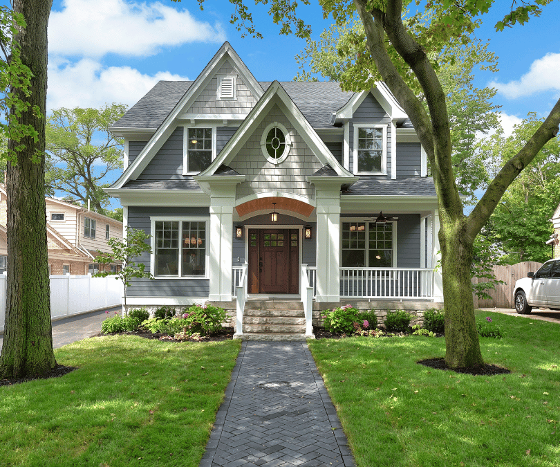 Illinois home with green front yard and trees